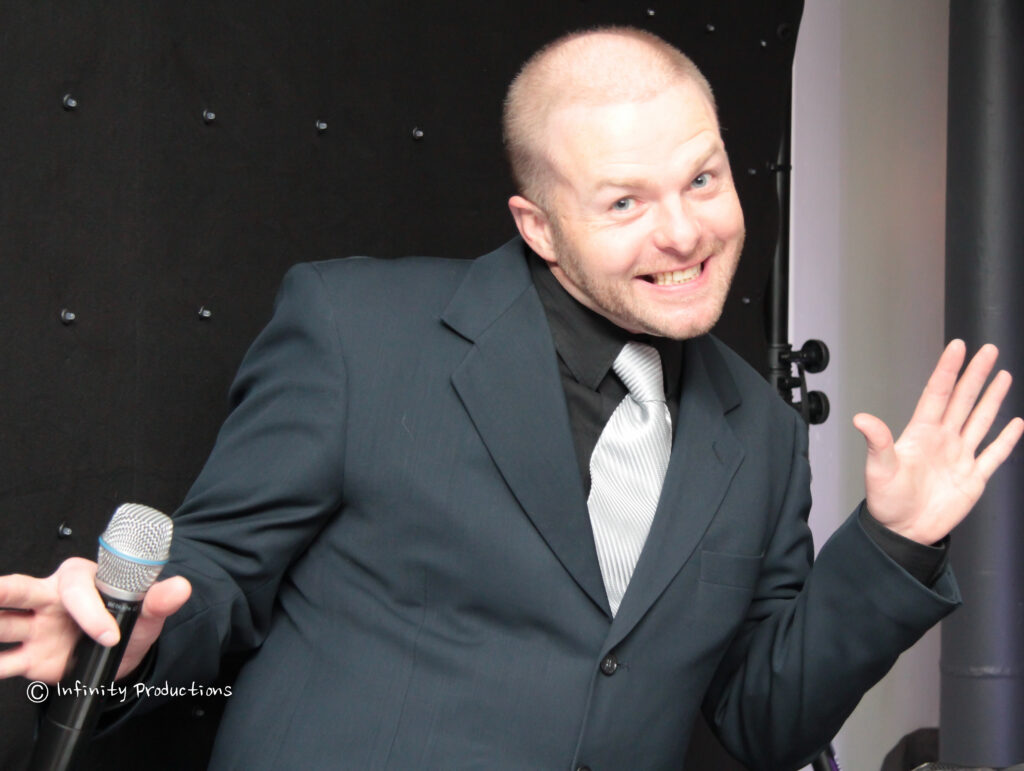 Michael Waldron dressed in a suit.