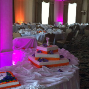 A table with a cake on it.