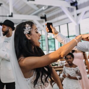 A bride and groom dancing at their wedding reception.