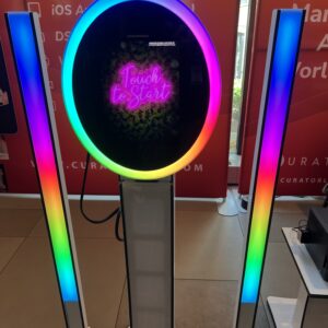 A display with a rainbow colored light on it, perfect for a photo booth rental.