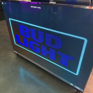 A large screen displaying a Bud Light logo in blue and white.